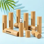 Unbranded bamboo roller bottles in assorted capped and open views