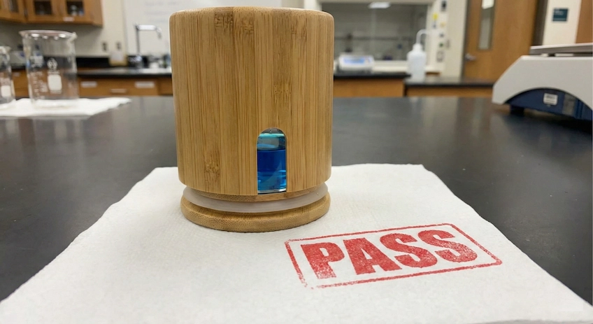 Water leak test comparing raw bamboo vs lined bamboo cosmetic packaging
