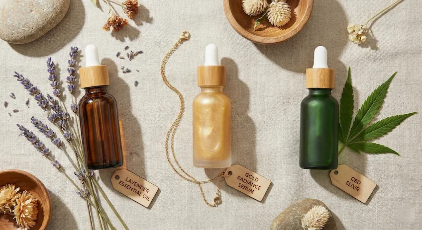 Three types of glass dropper bottles showcasing their best uses: Essential Oils, Facial Serums, and CBD Tinctures.