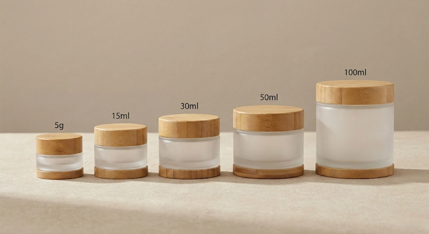 A complete range of bamboo cosmetic jars from 5g to 100ml, showing size comparison for different skincare products.