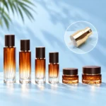 Amber Gradient Glass Bottles and Cream Jars – Gold Atomizer Inset