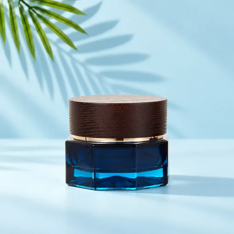 50g blue glass cream jar with dark wood lid and gold tone rim