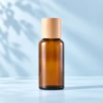 Large amber glass essential oil bottle with light natural wood cap